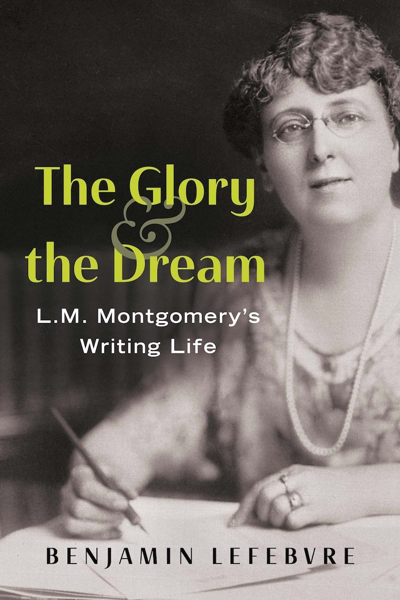 Cover of /The Glory and the Dream: L.M. Montgomery's Writing Life/, by Benjamin Lefebvre. The image consists of a black and white photograph of L.M. Montgomery seated at a desk, pen in hand, looking up at the camera.